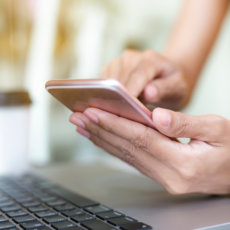 hands on a phone